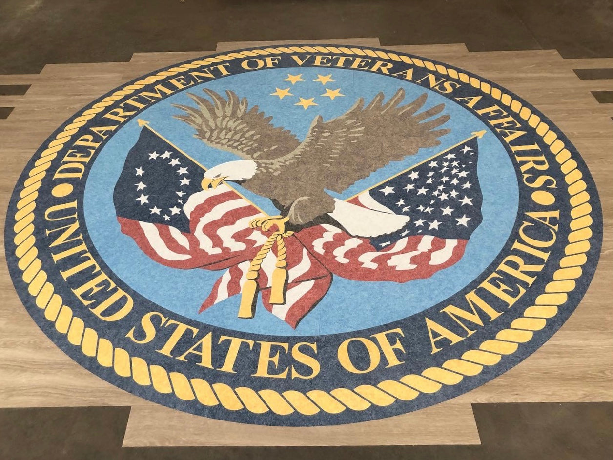 Load video: Video: Waterjet cut LVT logo for U.S. Department of Veterans Affairs