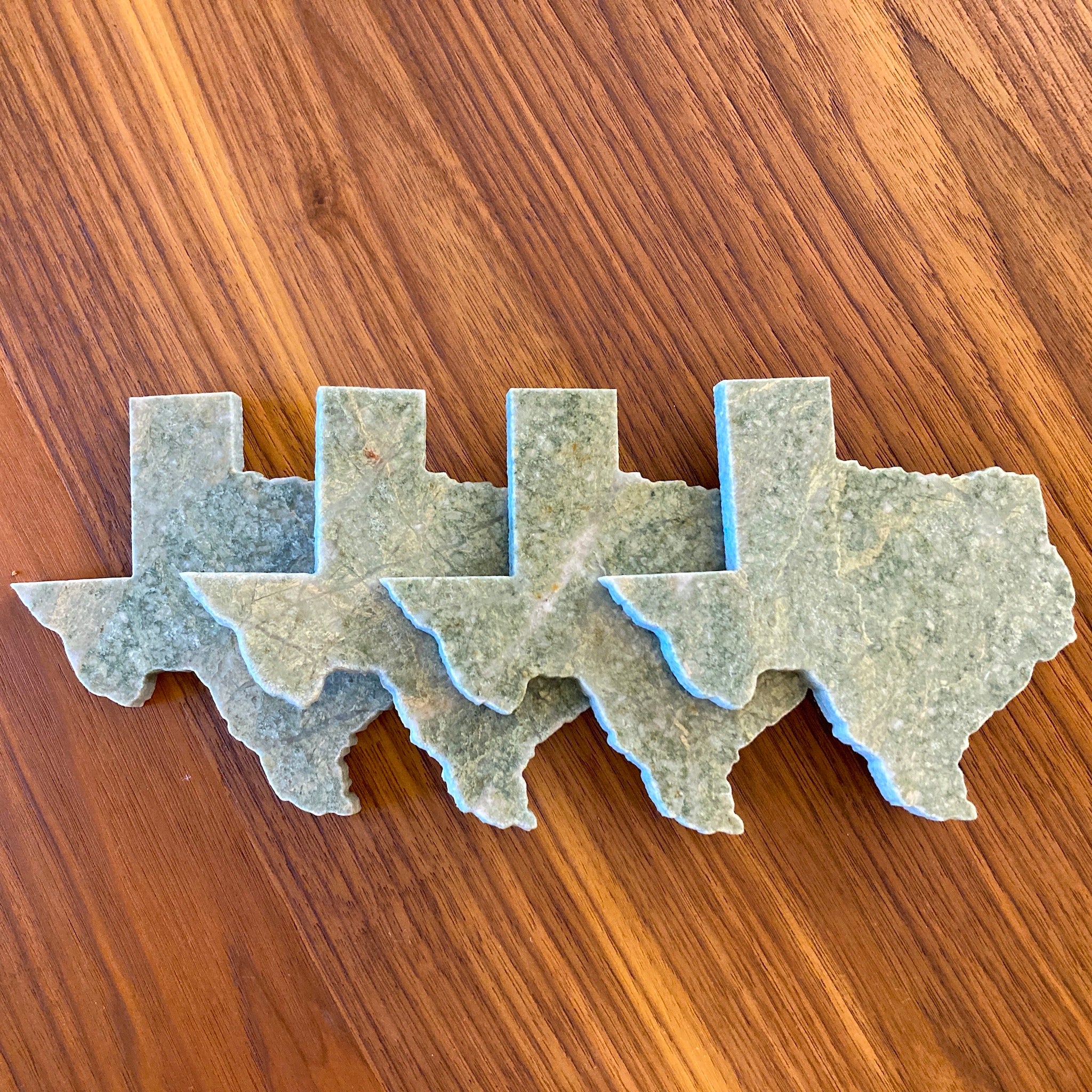 Stone coasters Waterjet cut into the state of Texas 